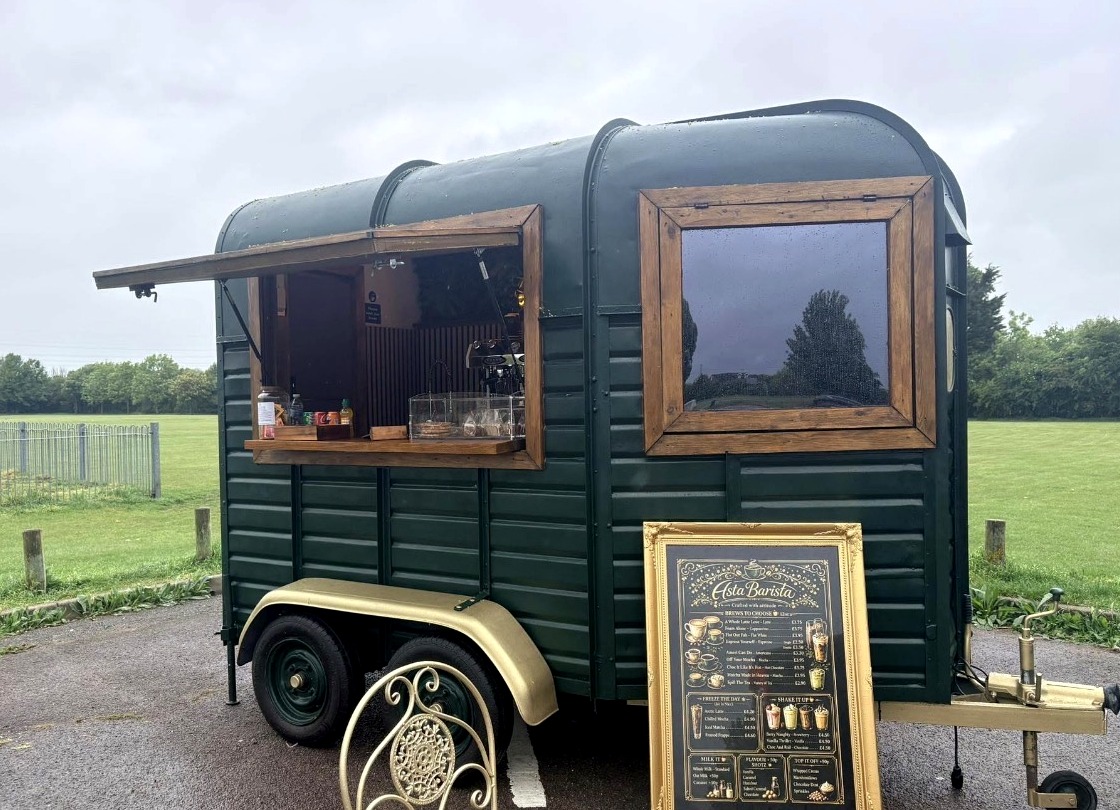 Dark green Asta Barista coffee trailer at John Fisher Playing Field